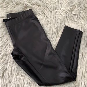 Express leather like leggings black size medium
